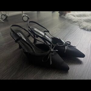 Black Pointed Slingback Heels with Bow Accent